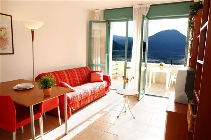 Budget Village Apartments - Porto Letizia Porlezza Habitación foto