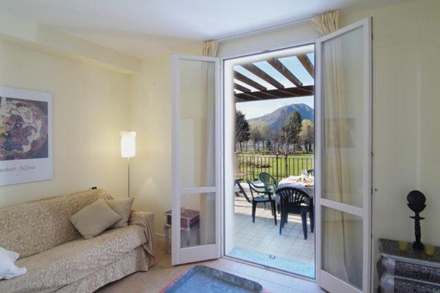 Budget Village Apartments - Porto Letizia Porlezza Habitación foto