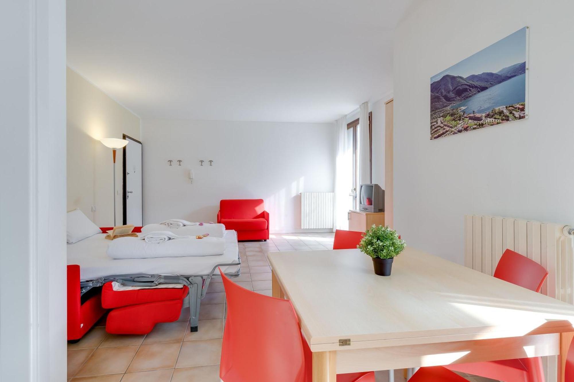 Budget Village Apartments - Porto Letizia Porlezza Exterior foto