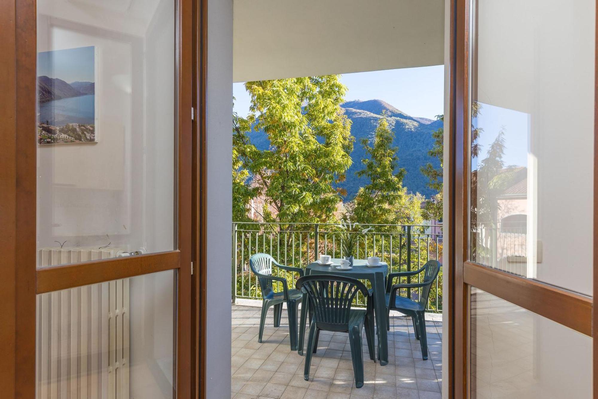 Budget Village Apartments - Porto Letizia Porlezza Exterior foto
