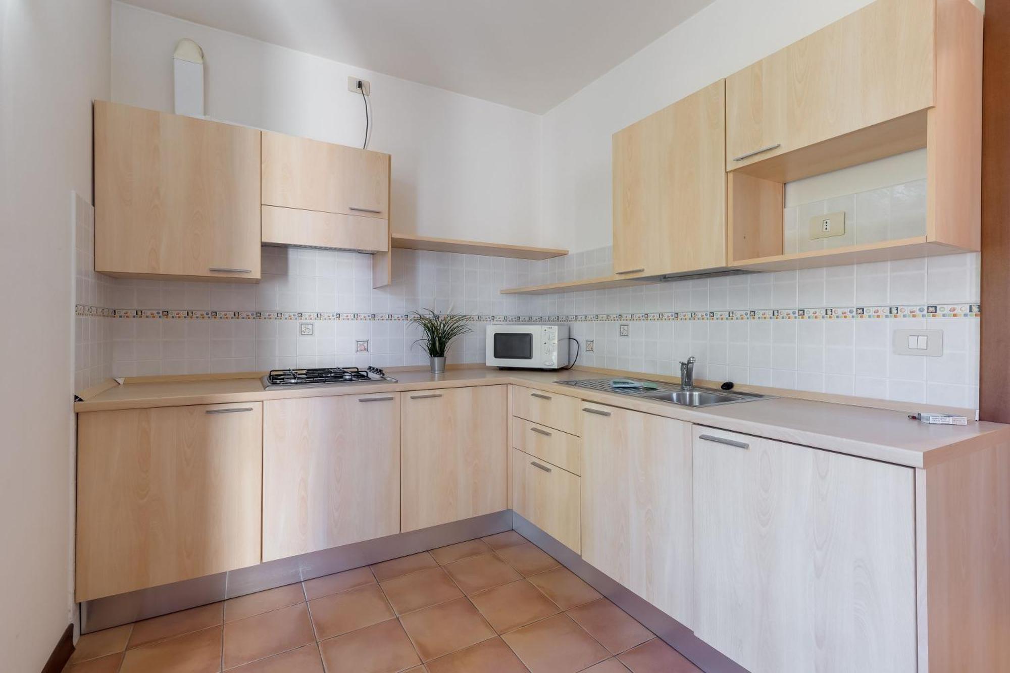 Budget Village Apartments - Porto Letizia Porlezza Exterior foto