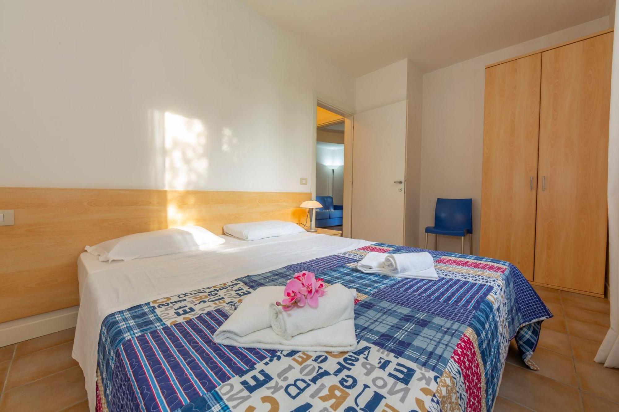 Budget Village Apartments - Porto Letizia Porlezza Exterior foto