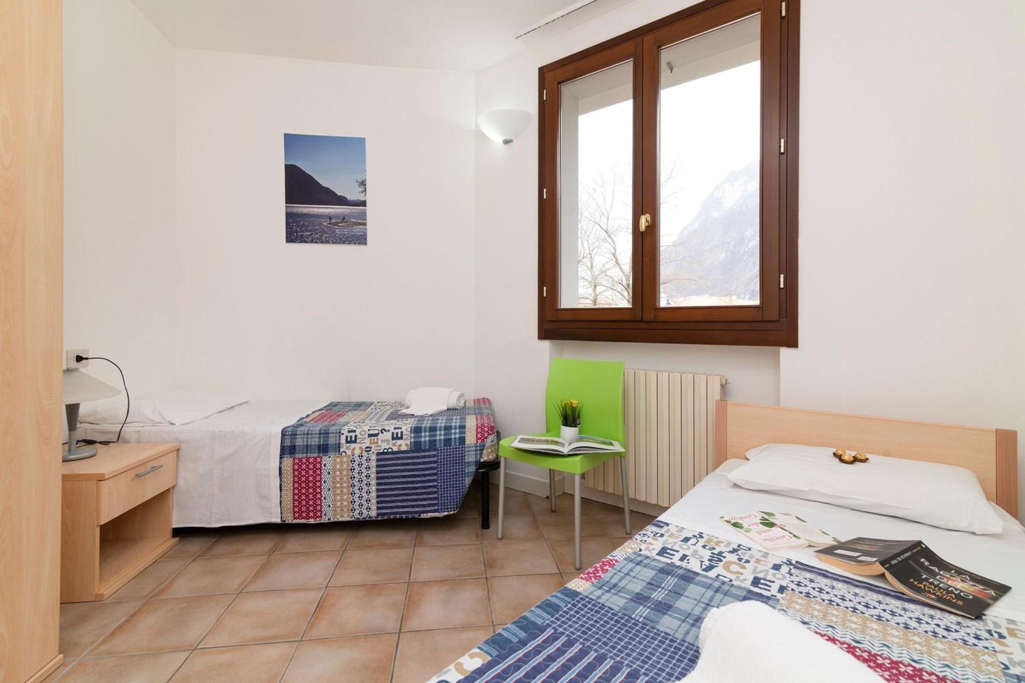 Budget Village Apartments - Porto Letizia Porlezza Exterior foto