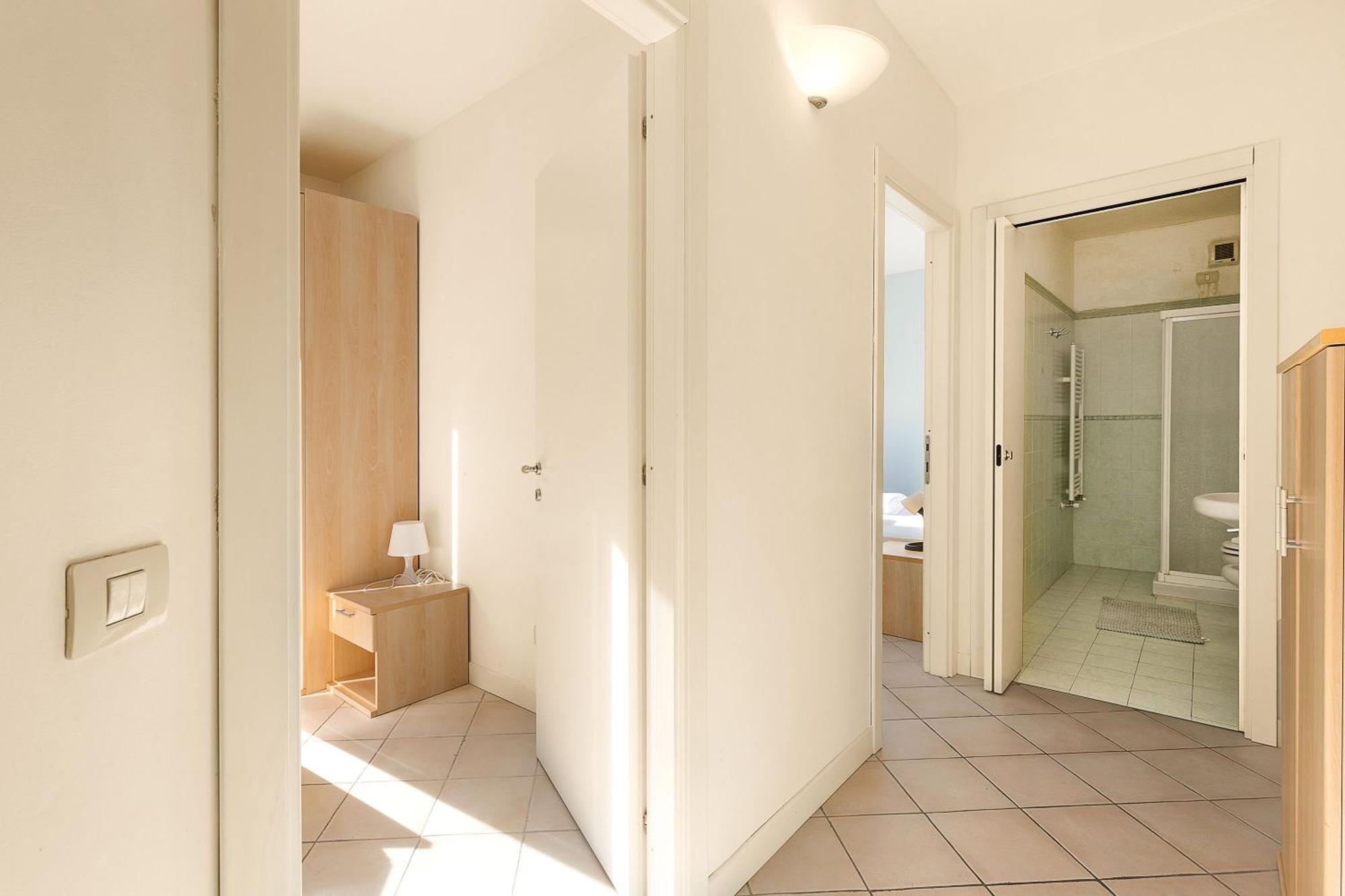 Budget Village Apartments - Porto Letizia Porlezza Exterior foto