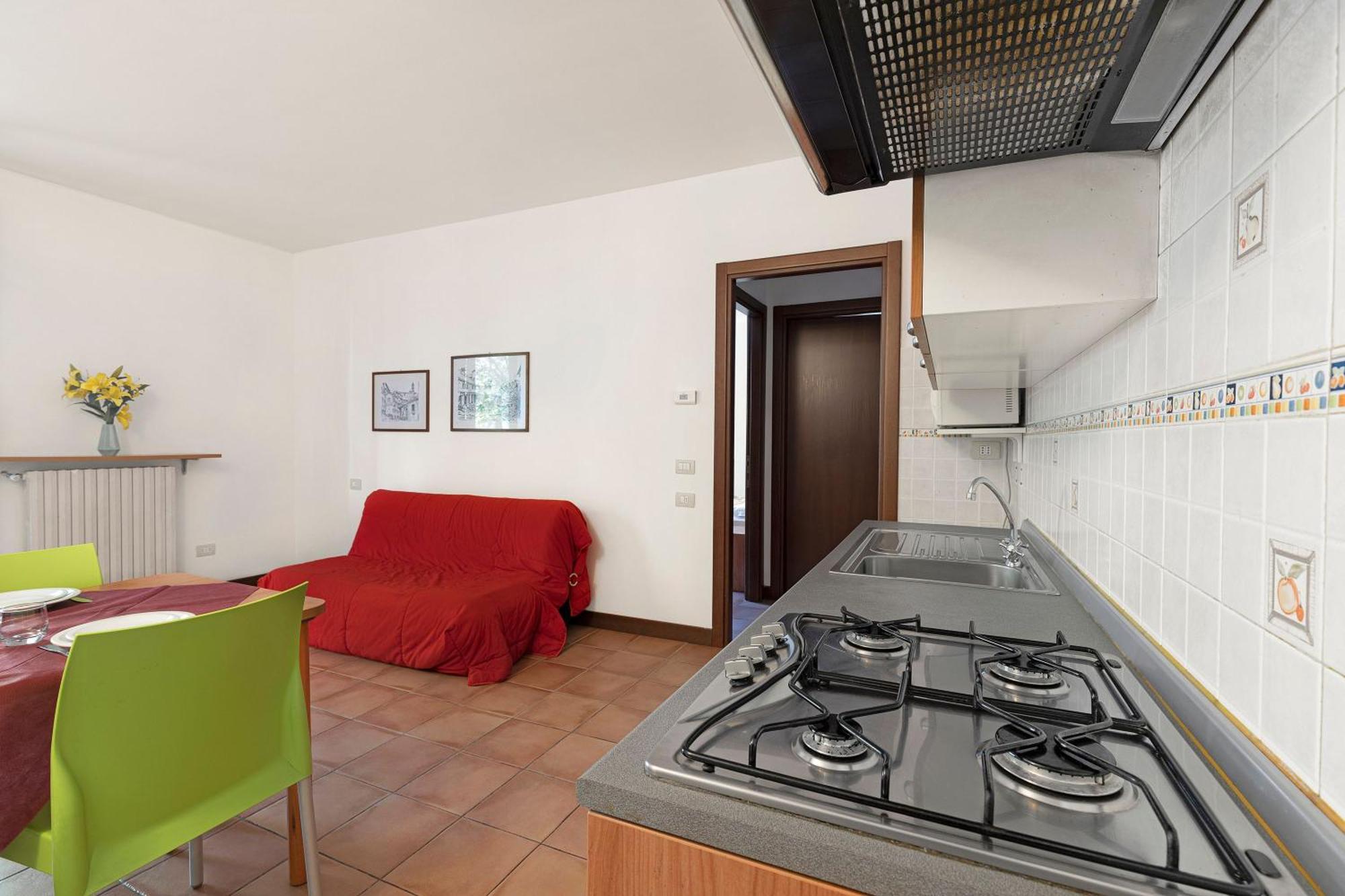 Budget Village Apartments - Porto Letizia Porlezza Exterior foto