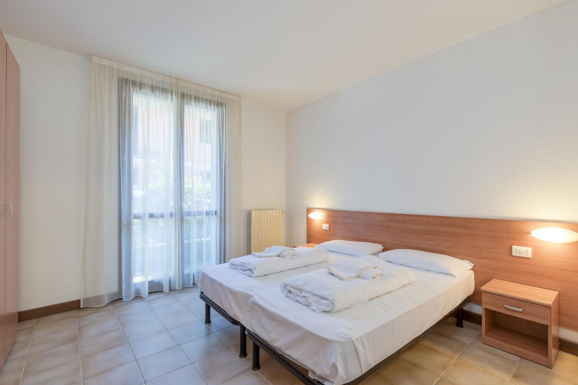 Budget Village Apartments - Porto Letizia Porlezza Exterior foto