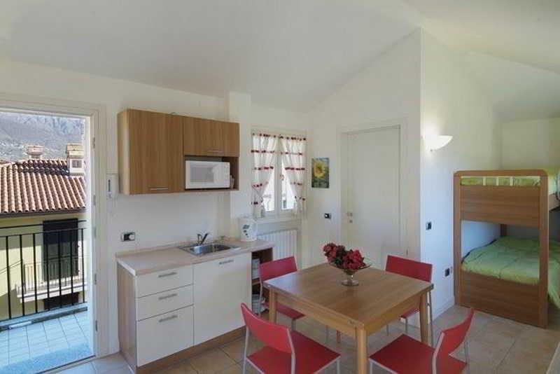 Budget Village Apartments - Porto Letizia Porlezza Exterior foto